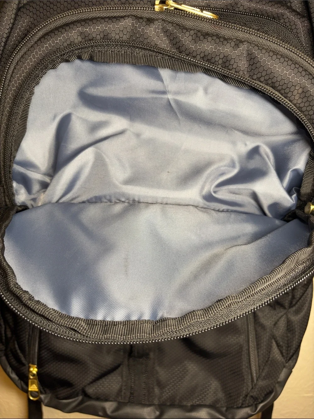 adidas Black Backpack with Gold Logo & Zipper Accents